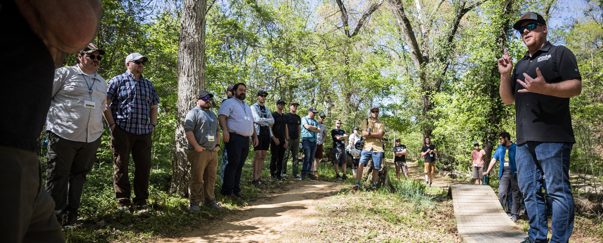 IMBA Foundations attendees on a trail