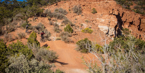 Mountain biker riding on BLM desert land near Cedar City, Utah